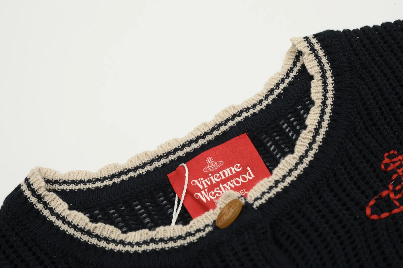 VIVI119# vivienne west wood West Queen Vivian Saturn New Retro "Unisex" Hollow Design Knitted Sweater Wool Round Neck 2024 Spring Latest Style Size: S -M- L Color: Apricot Royal Blue